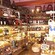 The interior of a neatly organized and well stocked wine shop